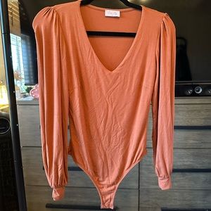 Pumpkin orange pink lily bodysuit
